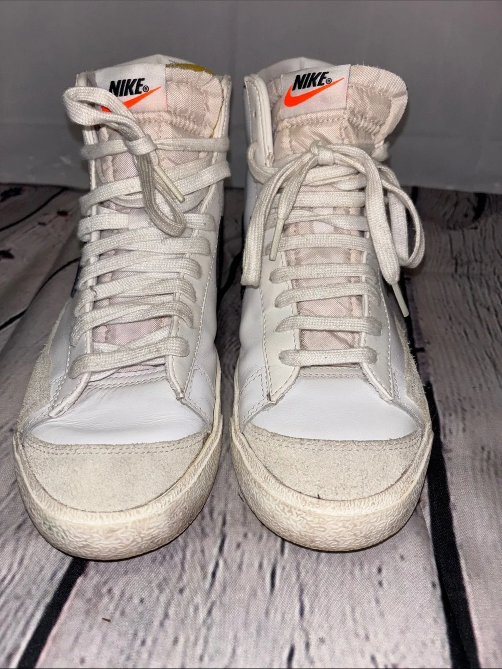 Nike White High-Top Sneakers with Black Stripe
